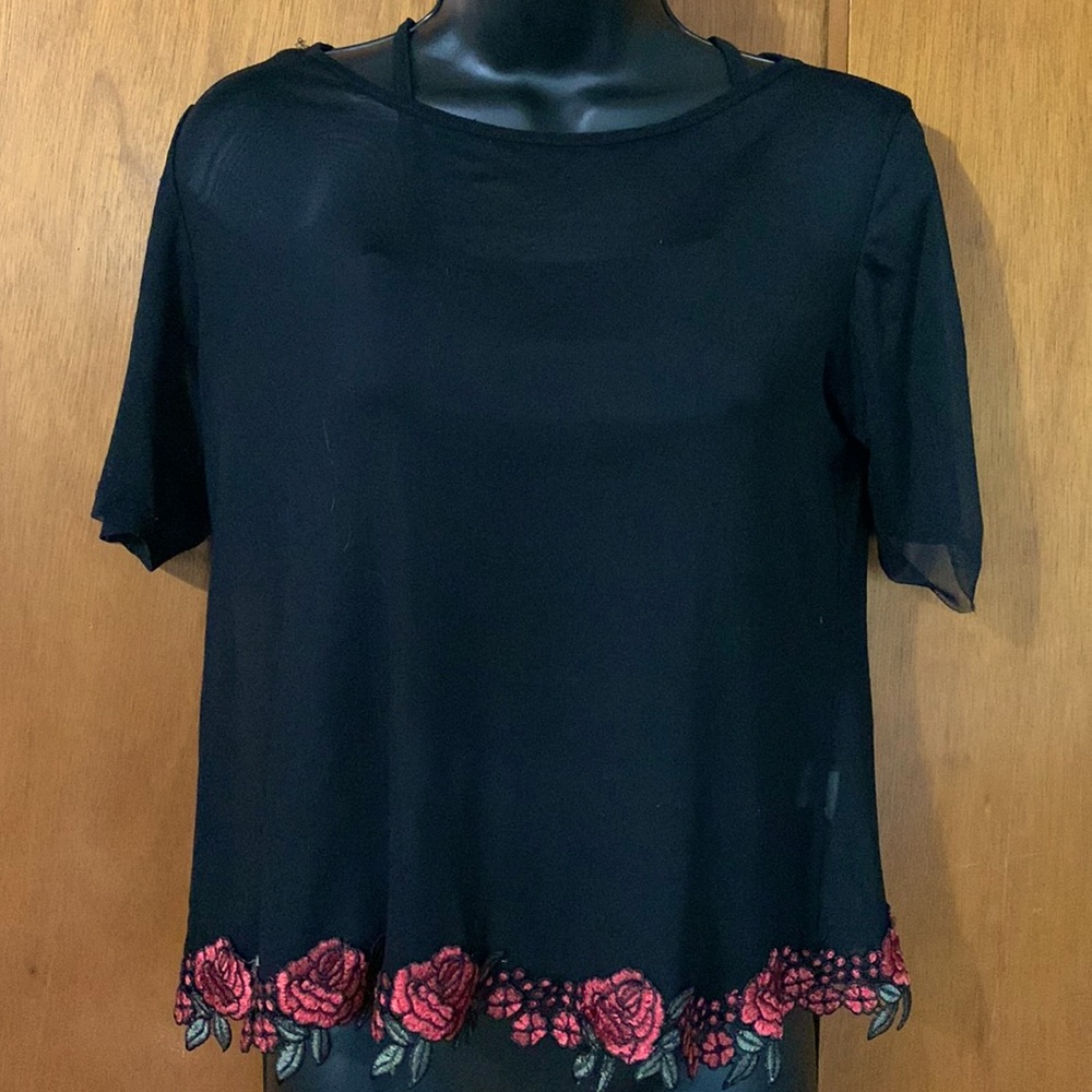Sheer black top by Potter’s Pot